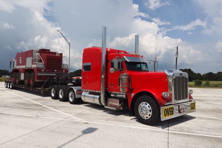 Oversize fire apparatus transport on RGN lowboy