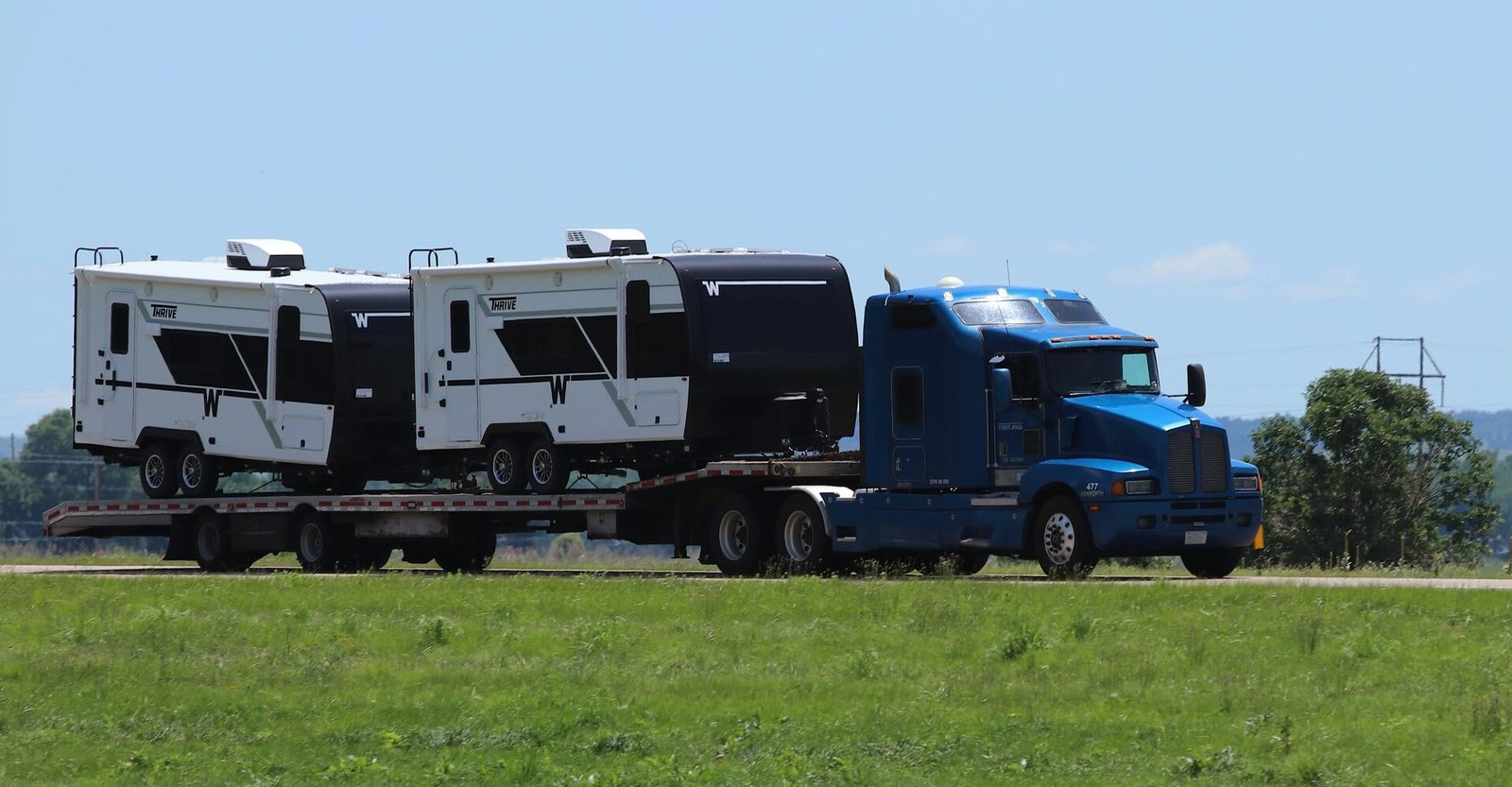 Double travel trailer haul on stepdeck